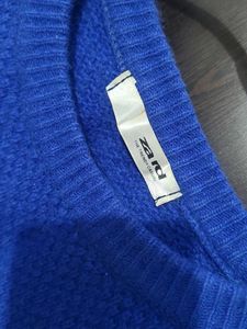 Branded Almost new -Blue Self design Sweater.