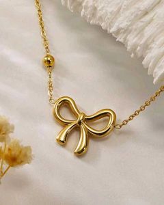 Gold Bow Pendant Necklace