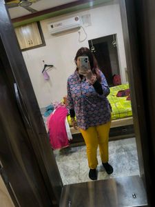 Mustard yellow churidar pant.