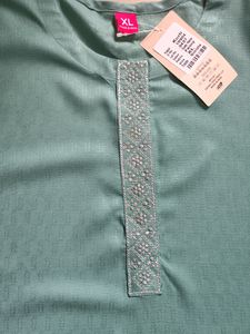 Mild Green Kurthi With Beautiful Work