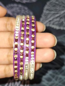 purple and white colour  bangles  with diamonds