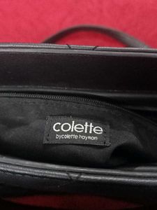 Pure Leather Black Handbag.
