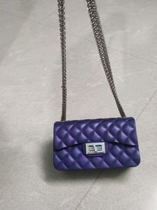 Purple Quilted Jelly Chain Bag...