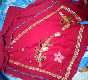 Elegant Red Saree with Floral Detail