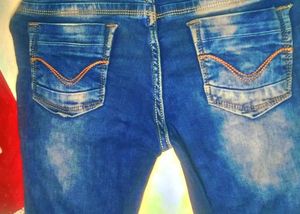 Ripped Blue Denim Jeans