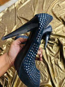 Blue studded heels