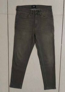 Grey Denim Jeans.     (Size- Waist 28. Length 30)