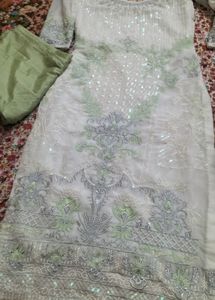 Beautiful Pakistani Suit With Net Frill Dupatta