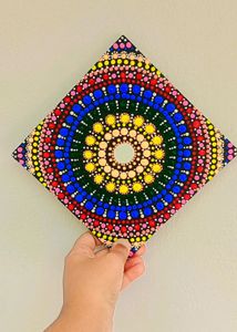 Its a handmade mandala art or dot art