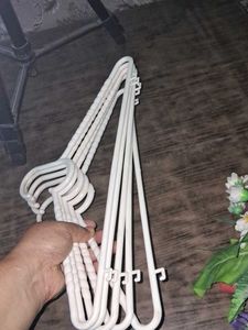 Set of 5 White Plastic Hangers
