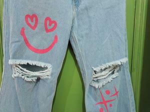 Ripped Jeans with Graffiti