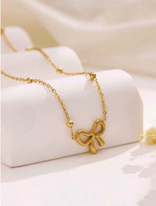 Gold Bow Pendant Necklace