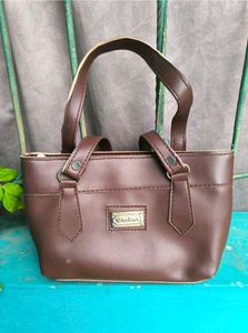 Set Of 4 Mini Handbags.