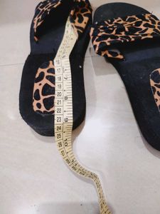 Animal Print Bow Flip Flops never used