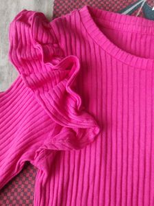 Pink solid ruffle top from Zudio