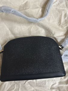 Kate spade glimmer sling bag