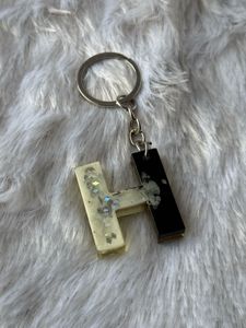 Spark &amp; Bloom – Dual-Tone Resin Alphabet Keychain