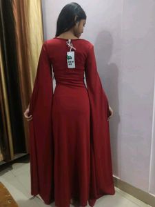 Elegant Red Gown with Cape Sleeves