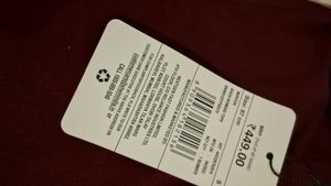 One-Shoulder bodysuit with tag.