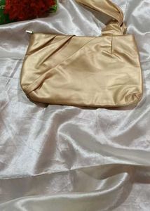 Elegant Gold Satin Clutch