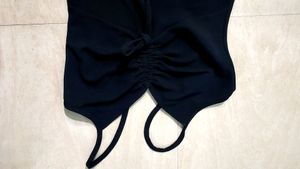 Black Ruched Bodycon Dress With tie up Details, has Shoulder Straps , Sleevesless