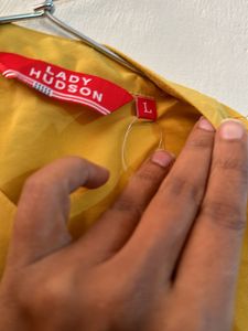 Mustard Sleeveless Shirt Or Top