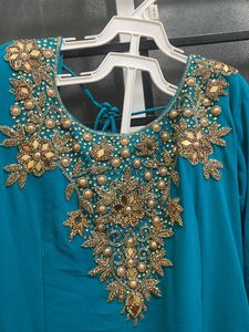 Elegant Teal Indian Outfit with Gold Stone