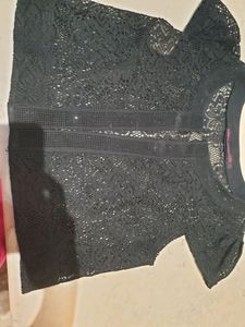 Black  beautiful net  jacket  can carry with any kind of jeans,skirt and straight kurti