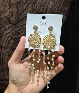 Round Pearls Tassel Earrings