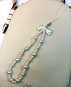 🤍 Elegant Pearl Beaded Phone Charm with Bow 🎀✨
