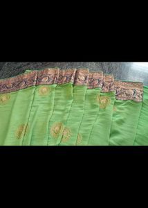 Eligent Green Saree With Peacock Pattern