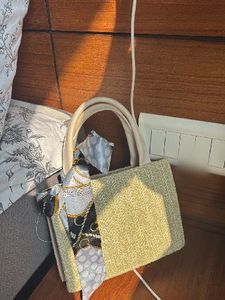 Chic Woven Handbag with Scarf Detail