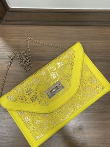 A Neon Cutwork Envelope Sling Bag