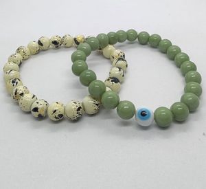Green Evil Eye And Marble Coloured Bracelet Combo