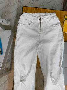 Distressed White Flare Jeans