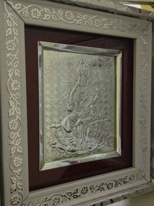 Silver lakshmi ganesh in dairy frame