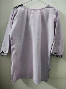 Purple colour kurti.