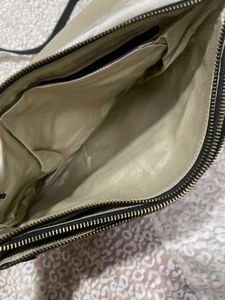 100% leather sling bag