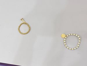 3 Beaded Pearl Bracelets With Charms
