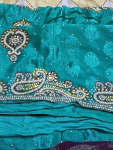Elegant Teal Embellished Saree