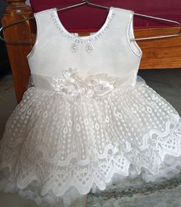 A Cute White Frilled Frock