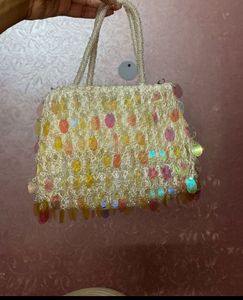 2 unique white black handbags