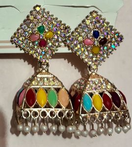 Traditional Earings Along With Dazzling Ring