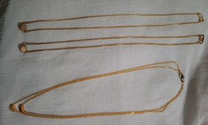 Gold tone layered necklaces