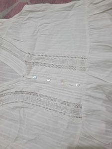 White Sleeveless Top