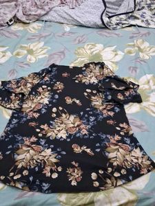 Floral Print Top Has Double Flared Sleeves