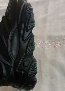 black chunky sole shoe