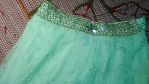 Women pista colour lahenga choli with dupatta...