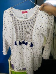 It's White Colour Short Kurti I Bought From Market