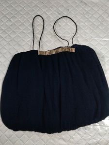 Elegant Blue Top with Embellished Neckline